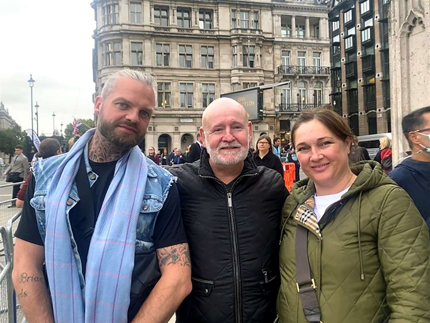 Matthew Edwards, 35, James Across, 65, and Amy Harris, 34, after paying respects at Westminster Hall (Nina Lloyd/PA)