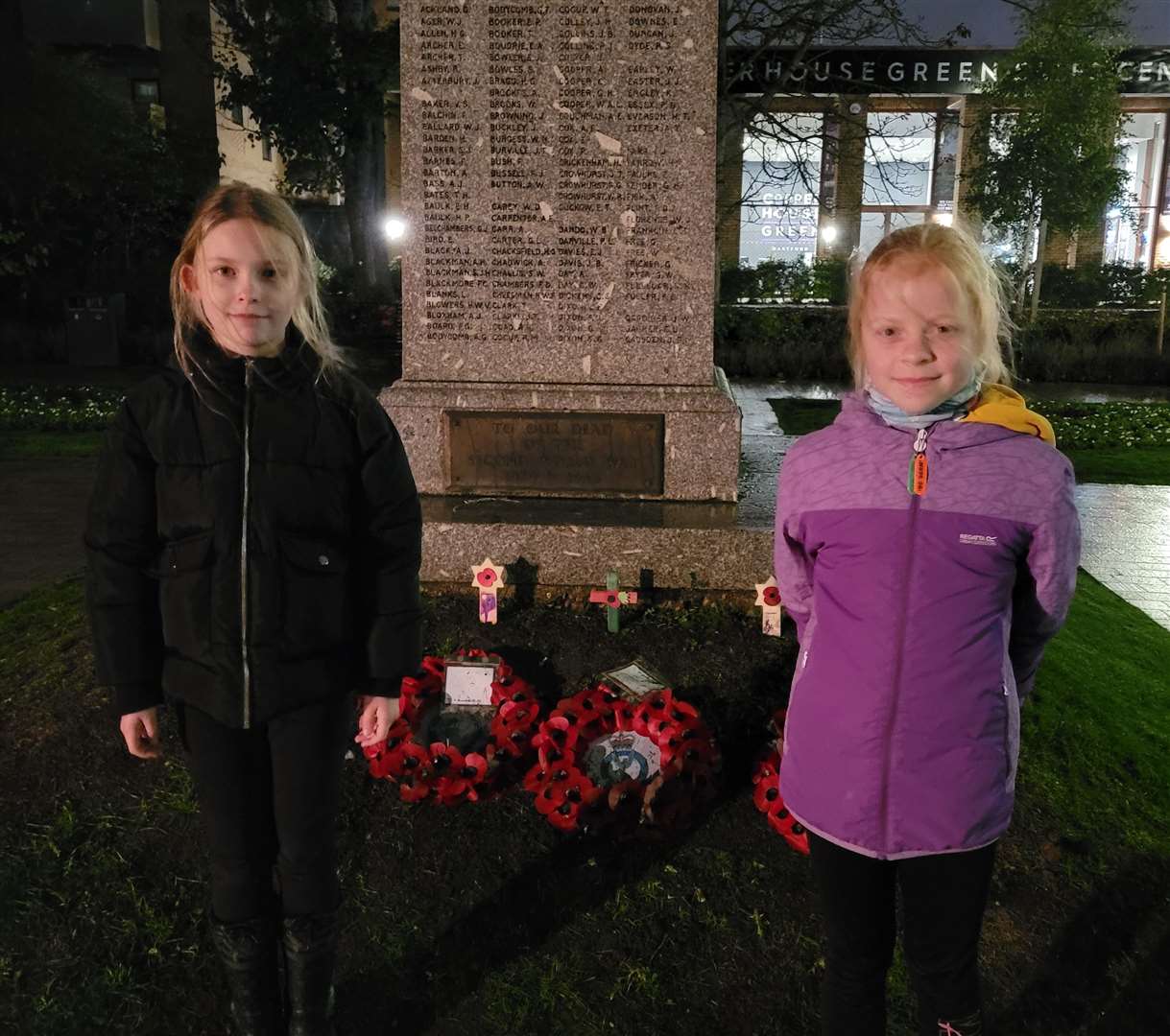 The girls were excited to see one of their handmade crosses be placed on the war memorial