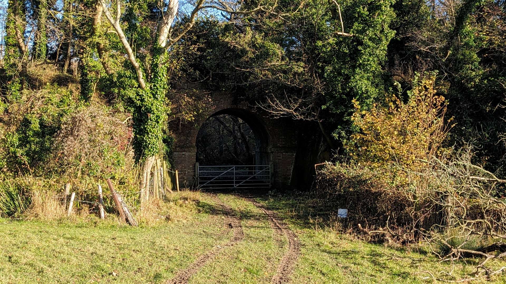 A tunnel leading under the former railway line