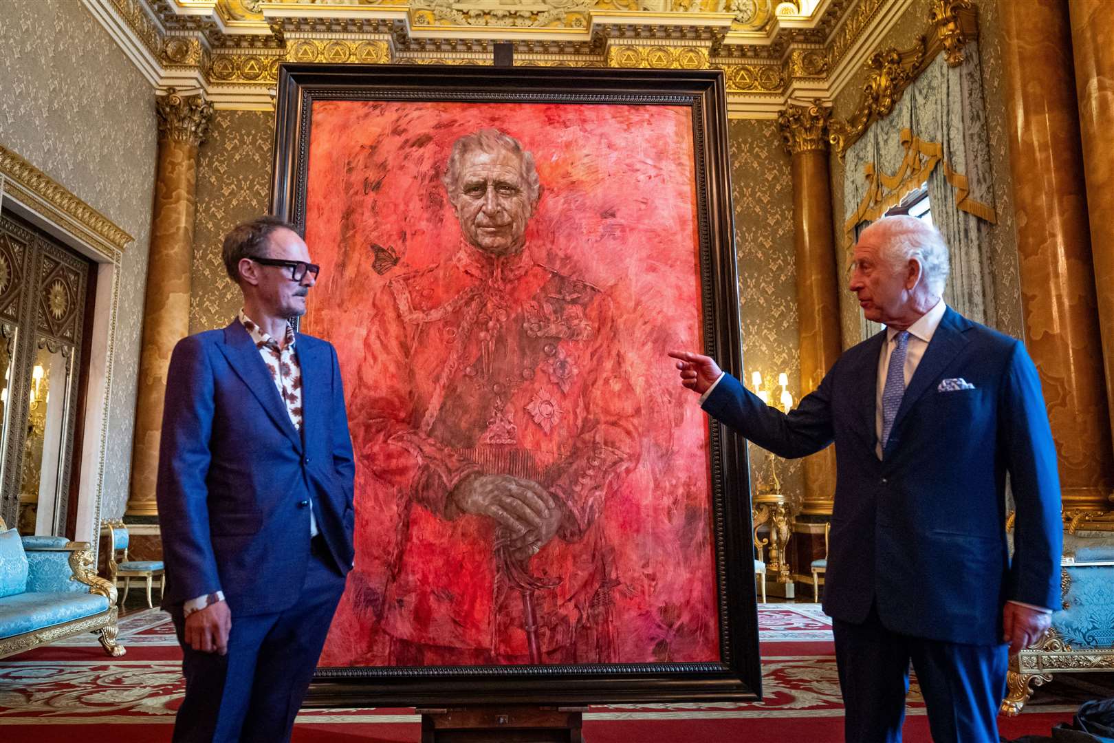 Artist Jonathan Yeo and Charles at the unveiling of Yeo’s portrait of the King in the Blue Drawing Room at Buckingham Palace (Aaron Chown/PA)