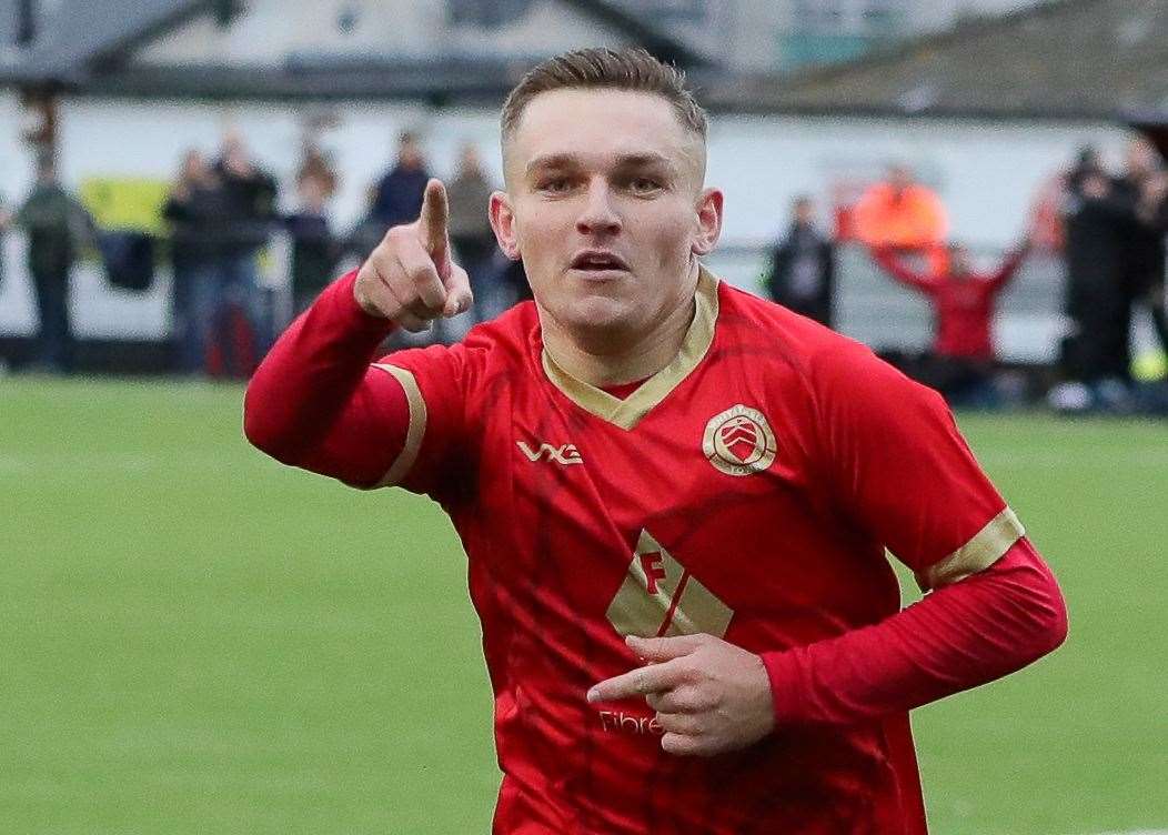 Josh Oliver celebrates his goal for Whitstable. Picture: Les Biggs