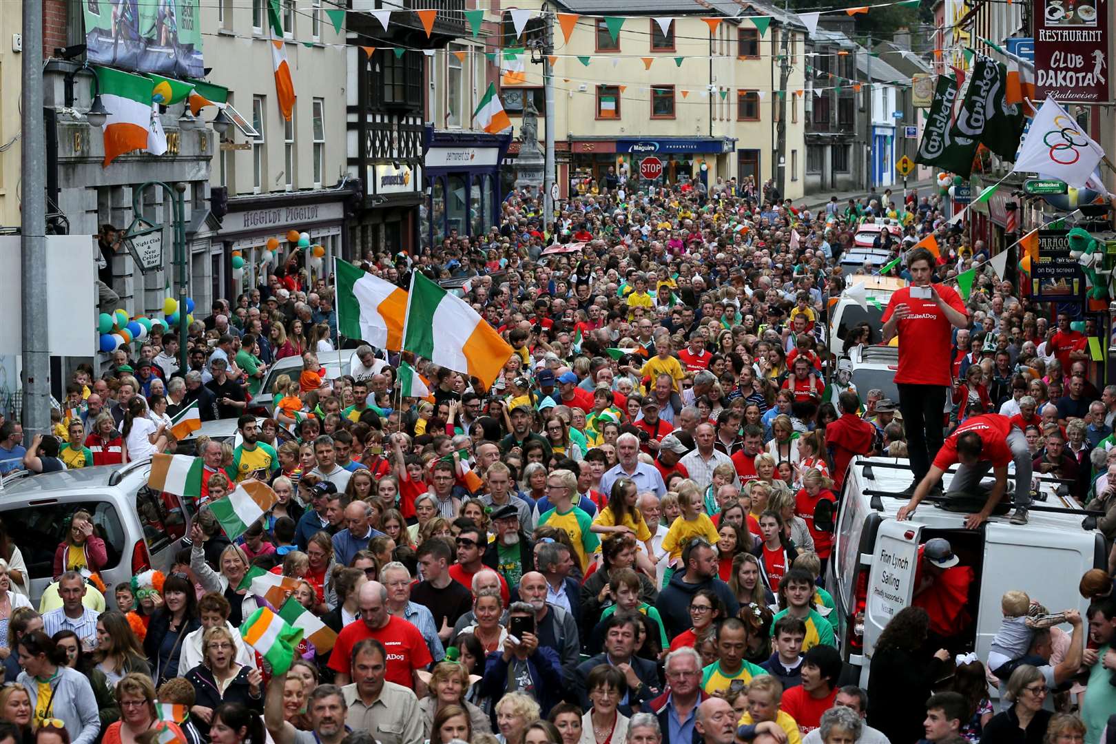 Fans line the streets during a homecoming parade in Skibbereen, Co Cork, in 2016 (Brian Lawless/PA)