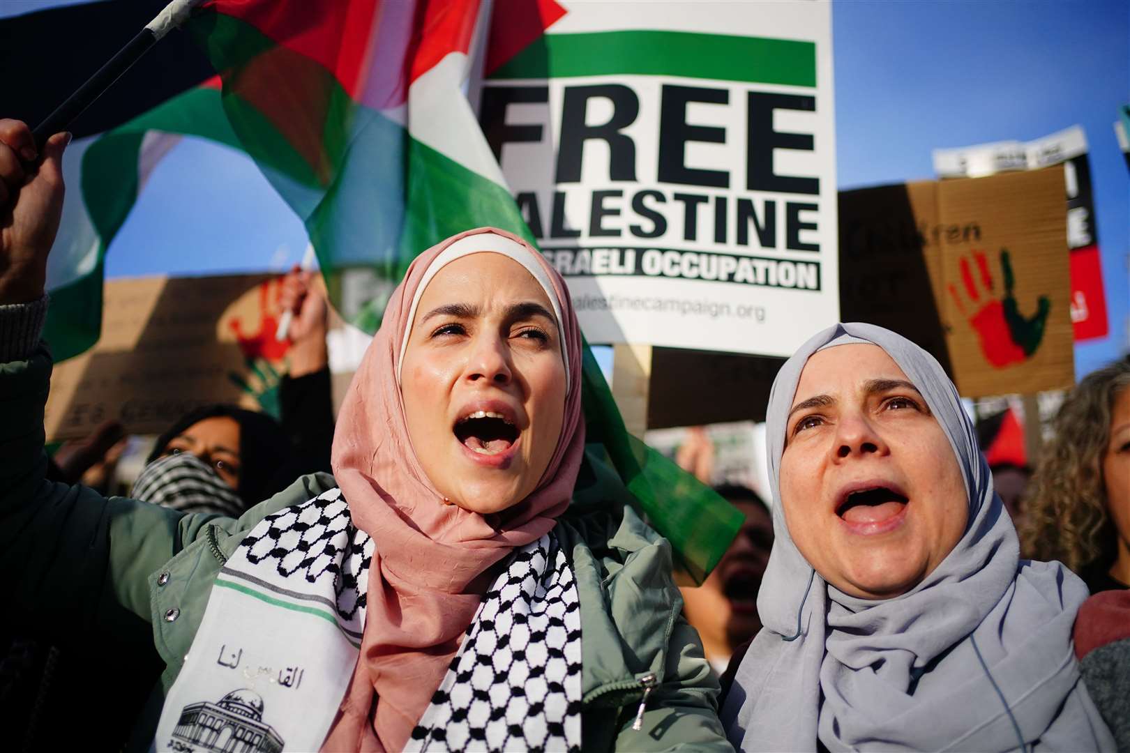 People at a rally in Trafalgar Square (Victoria Jones/PA)