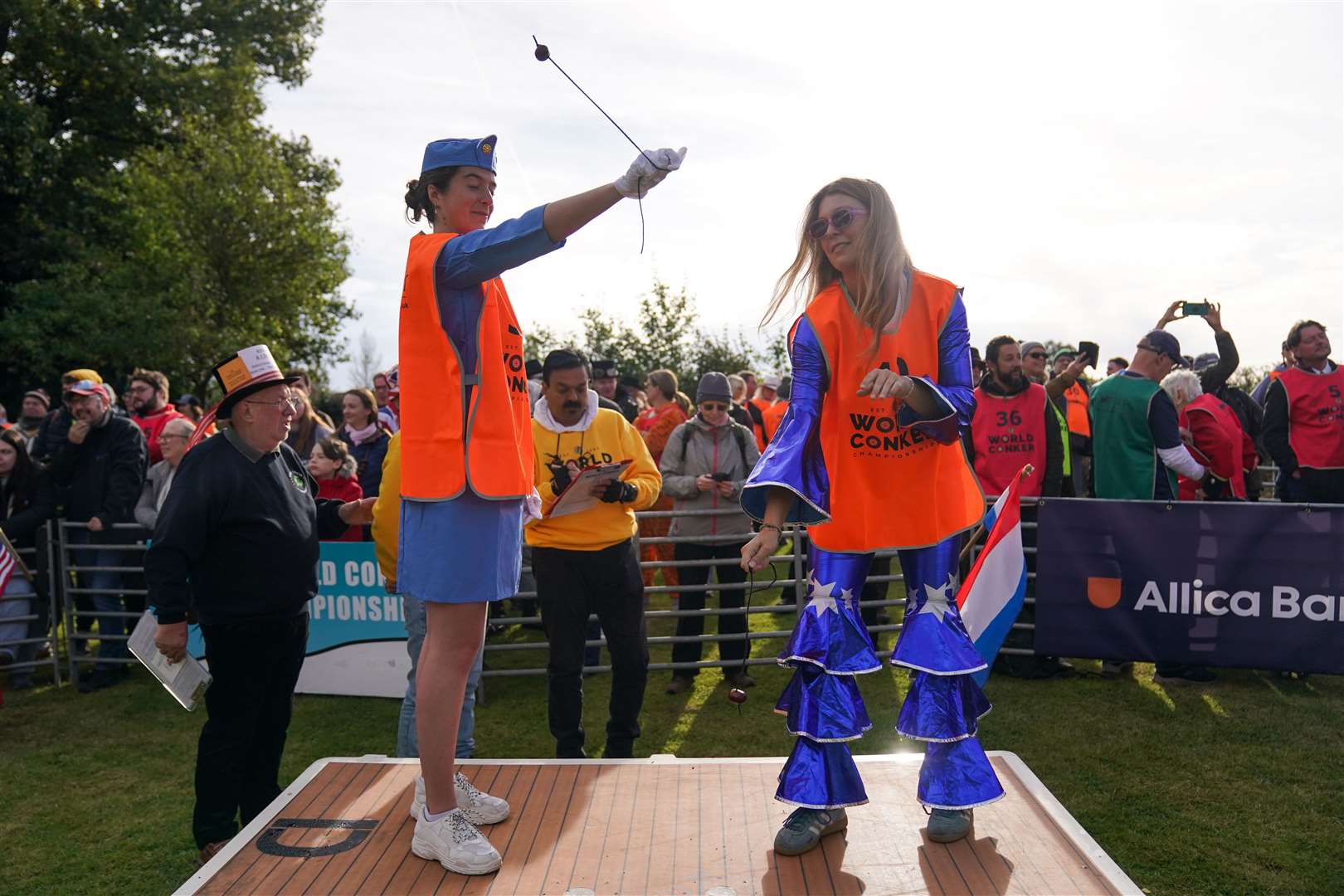 Competitors taking part in the annual World Conker Championships (Jacob King/PA)