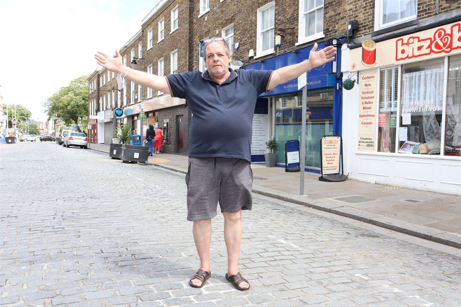 Where have all the shoppers gone? David Schwab of Bitz and Bobs looks for customers in Sheerness Broadway. Picture: John Nurden