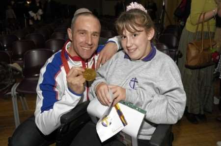 Charlotte Whale receives her award from Jamie Staff