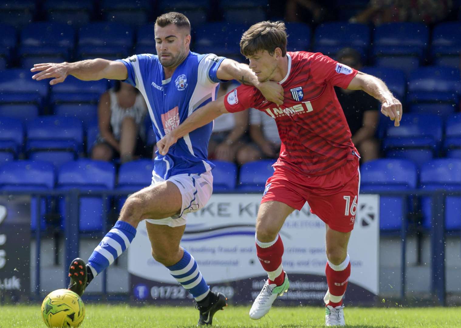Gills' Billy Bingham battles hard in midfield Picture: Andy Payton