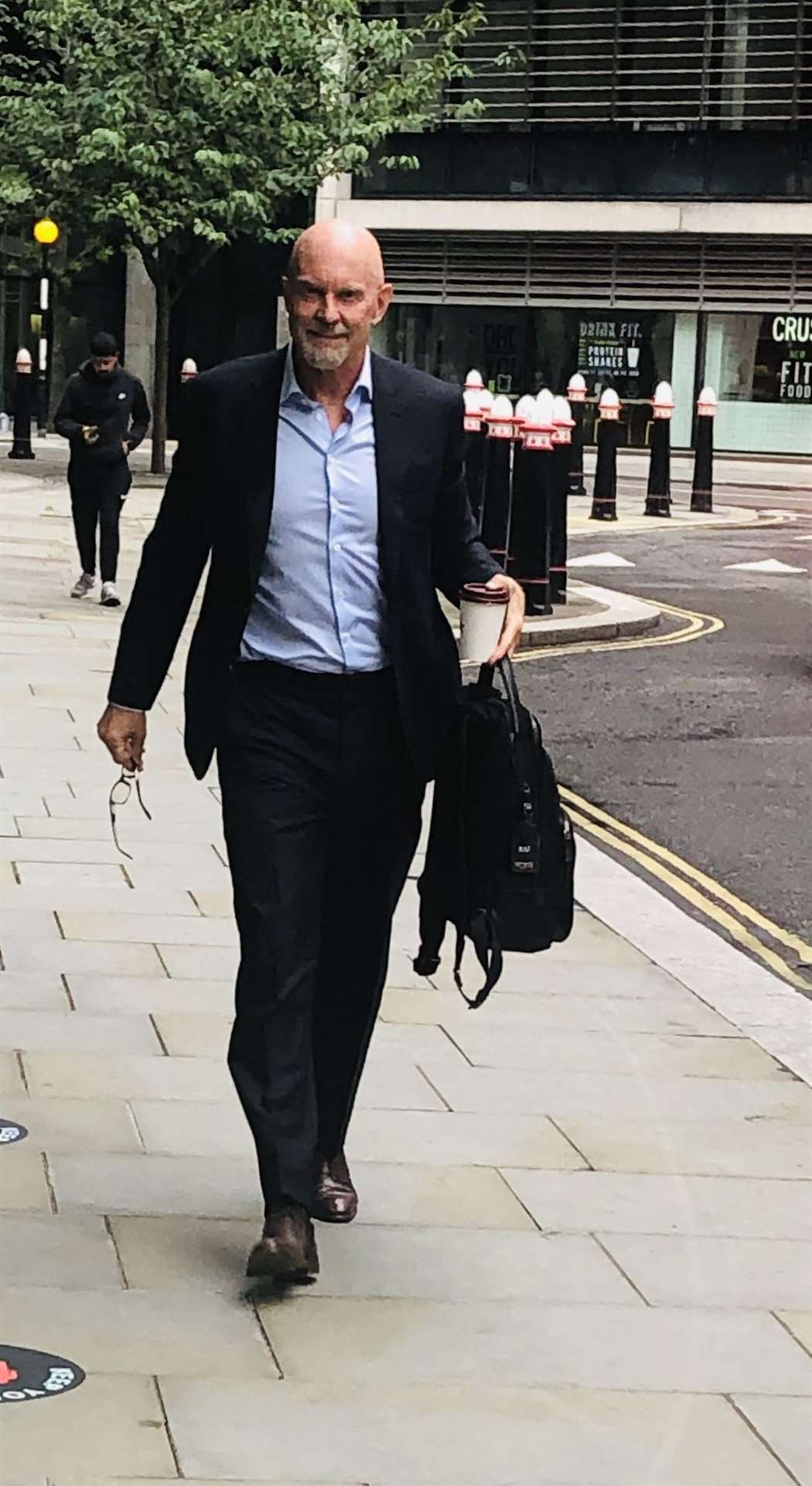 Former Barclays boss Roger Jenkins arrives at the High Court in London during a trial involving businesswoman Amanda Staveley (Brian Farmer/PA)