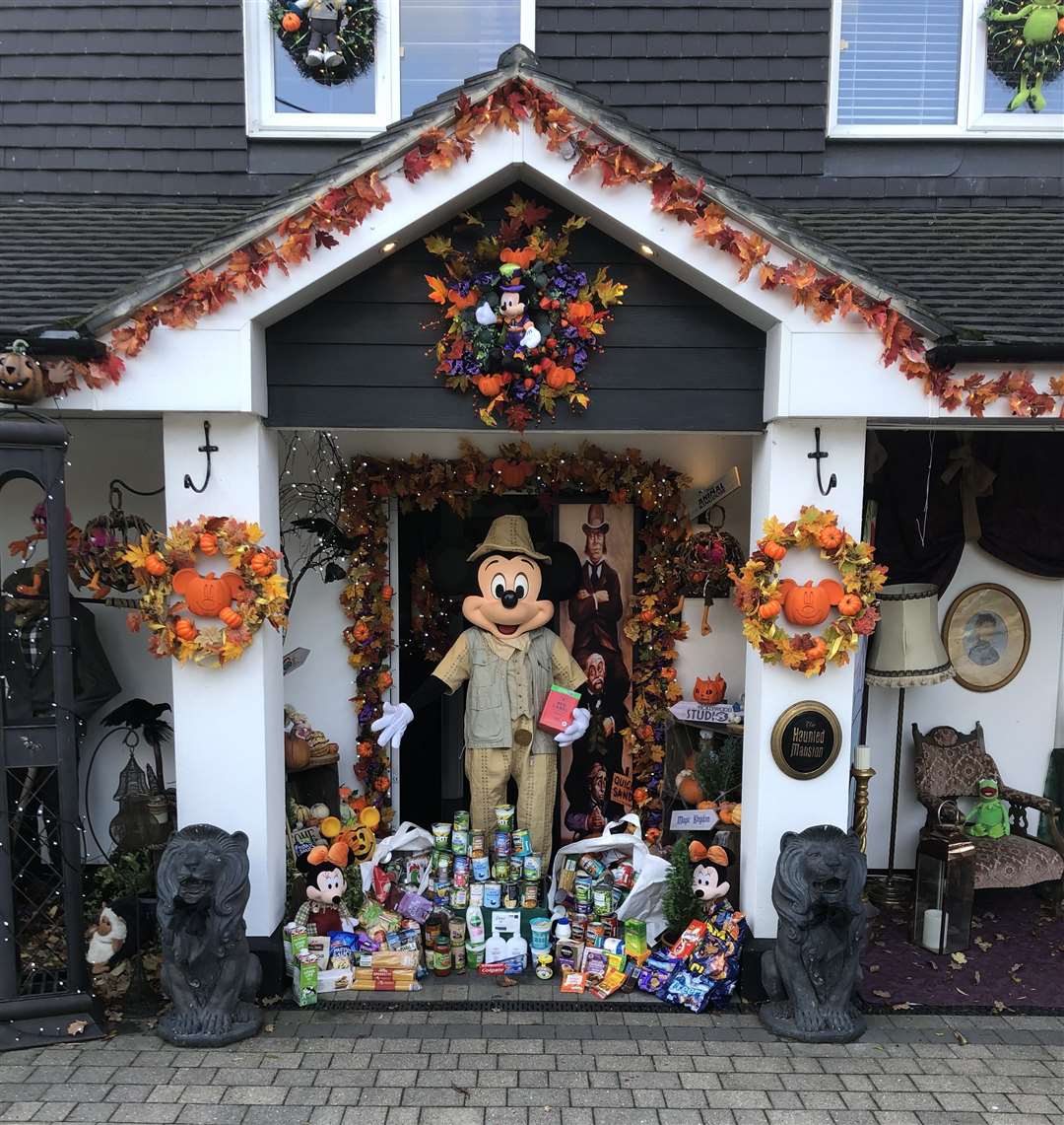 A famous mouse has come to collect their recent foodbank donations. Picture: Lavinia Hedges