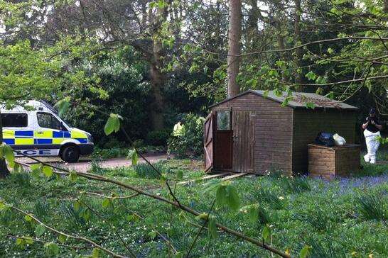 Forensics officers photograph a shed in Peaches Geldof's garden. Picture: Kiran Kaur