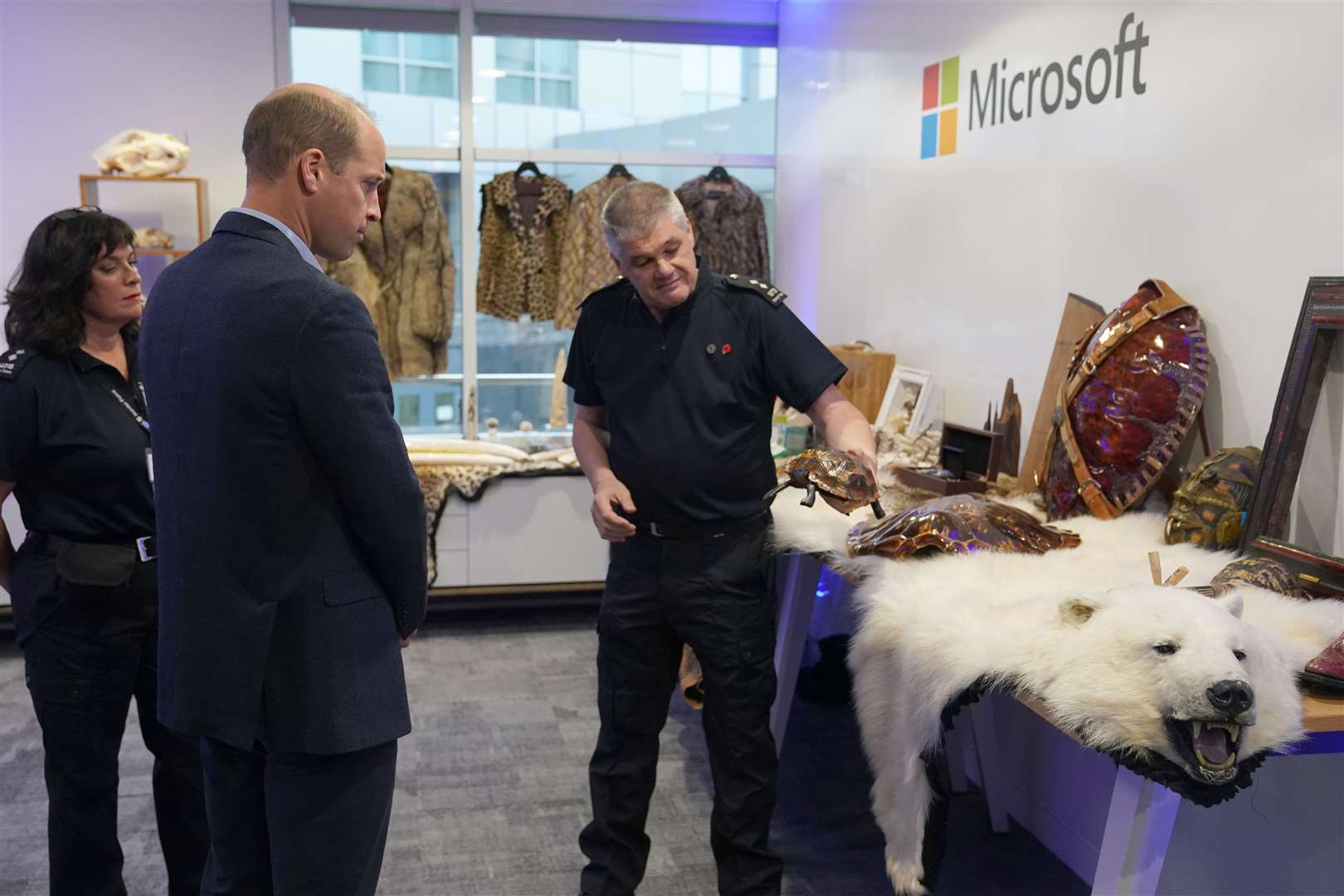 William is seen analysing products seized at airports (Steve Parsons/PA)