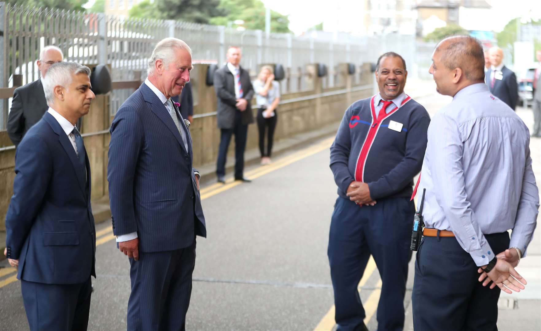 The Prince of Wales, second left, and Mayor of London Sadiq Khan, left, chatted to staff (Chris Jackson/PA)