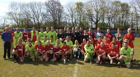 The teams get ready for the start of the match at Hartsdown Park. Picture: TERRY SCOTT