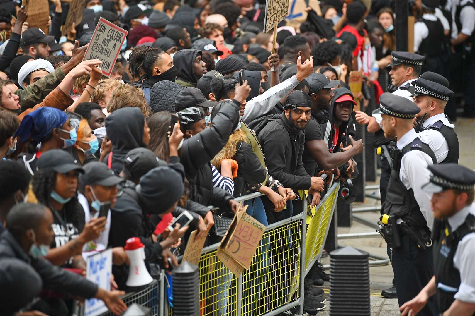 Protesters face police at the entrance to Downing Street (Victoria Jones/PA)