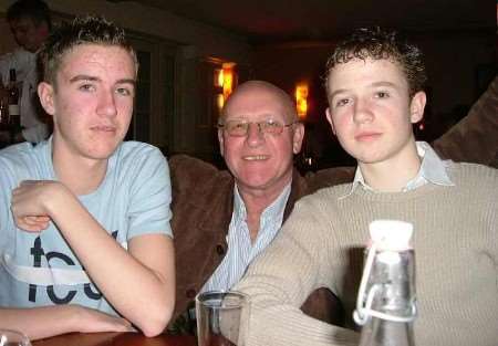 Ollie Griffiths, left, pictured with his father Paul and twin brother Toby