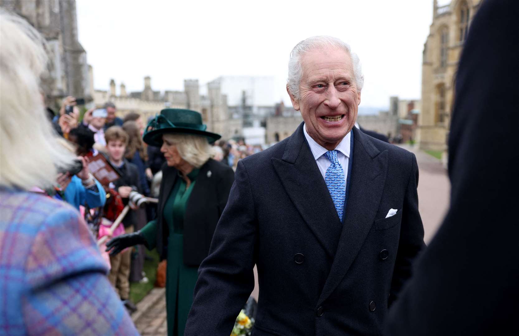 The King and Queen on a walkabout after the Easter Mattins Service at St George’s Chapel at Windsor Castle (Hollie Adams/PA)