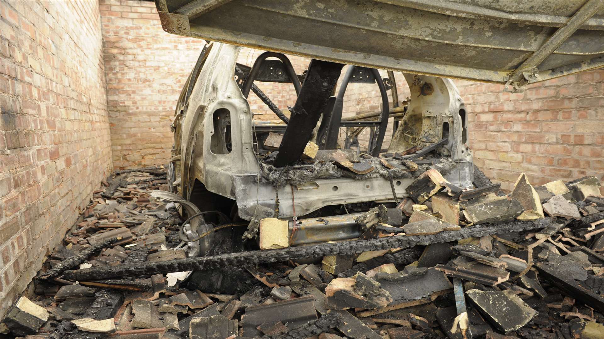 Another burnt out car in a garage in Boxley Road, Walderslade.