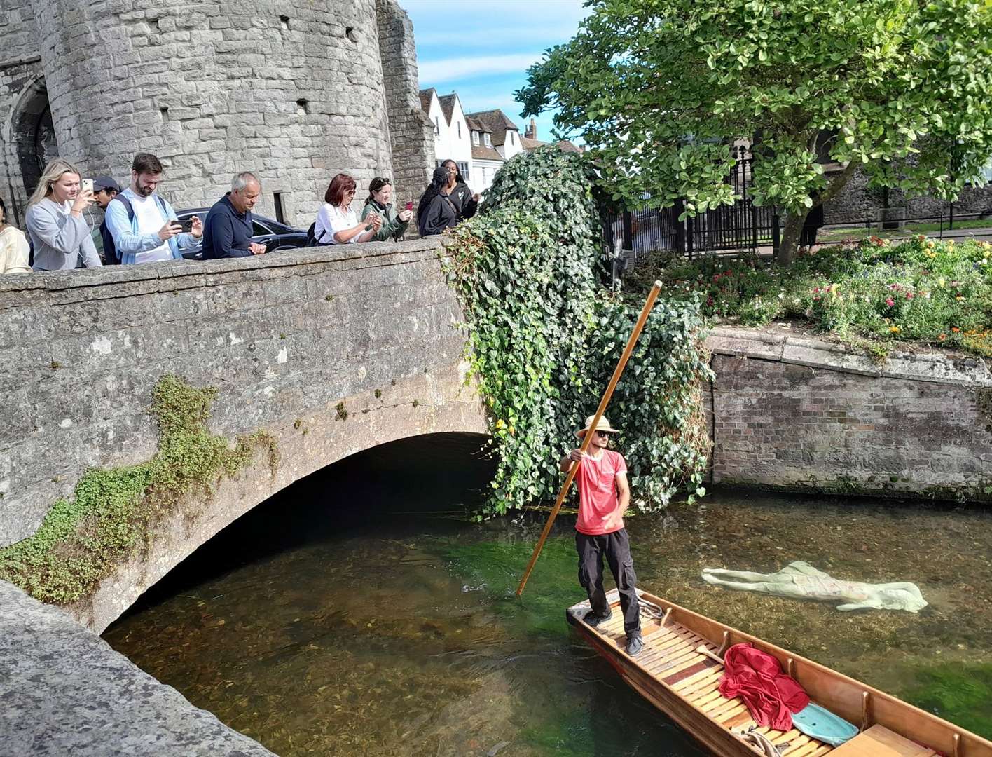 The new Alluvia statue in the Stour by the Westgate Towers in Canterbury is an intriguing sight for visitors