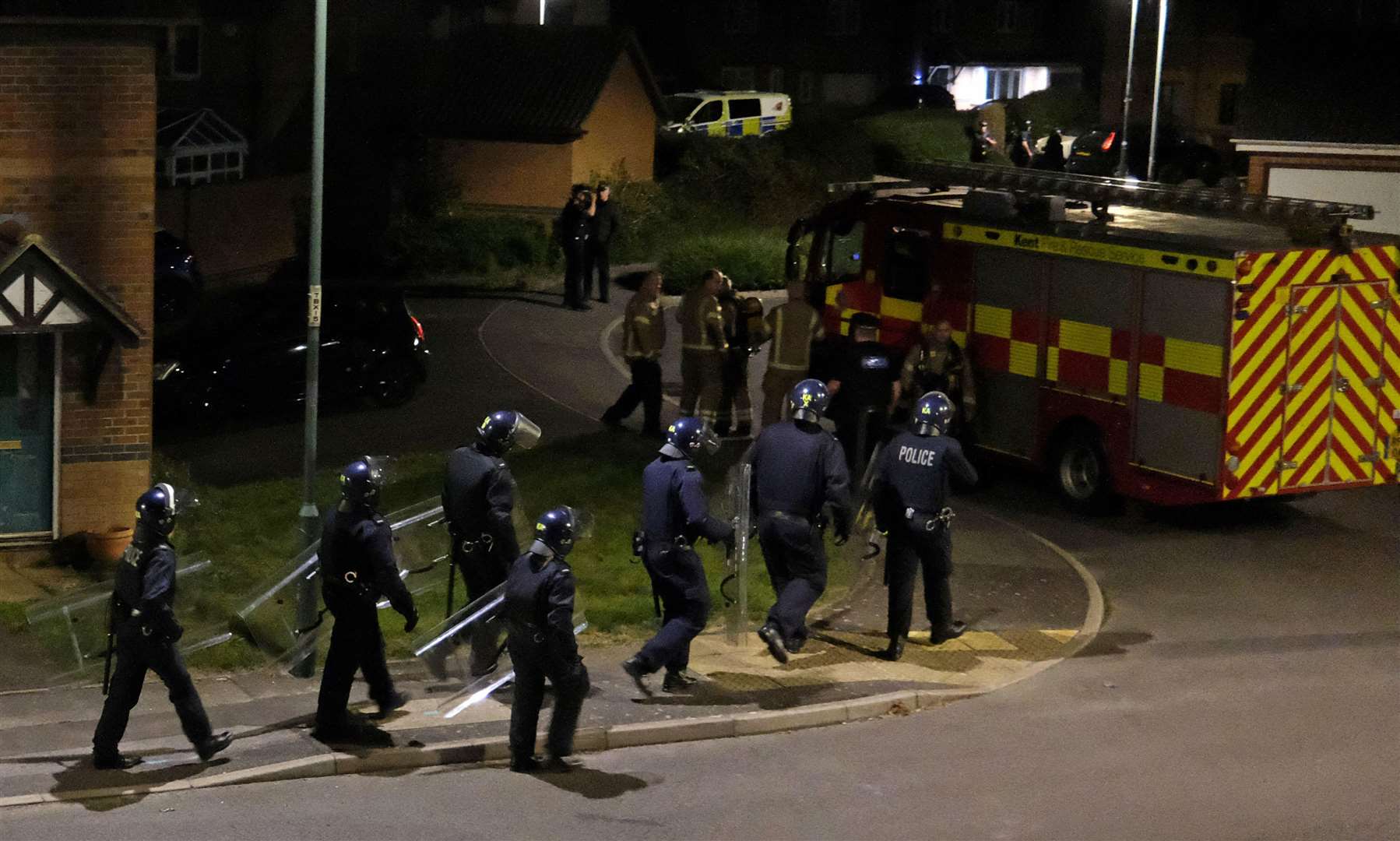 Police in riot gear in Burrstock Way, Rainham. Picture: Robin Halls