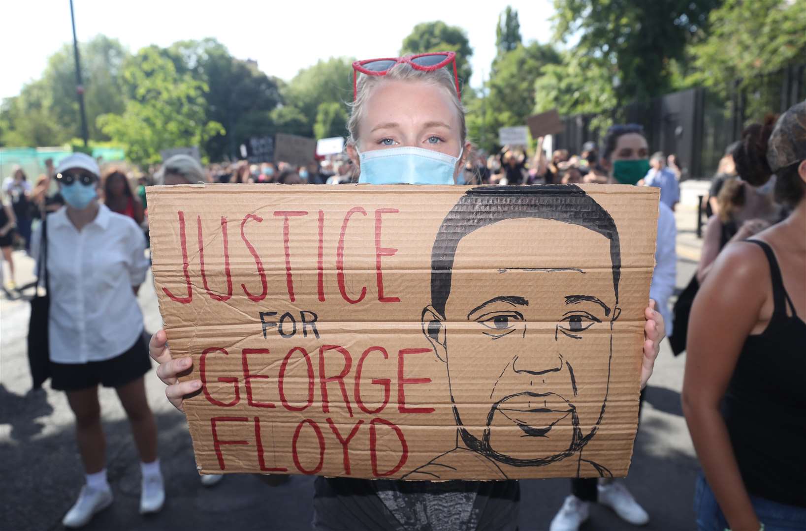 People at a Black Lives Matter protest rally outside the US Embassy in Dublin following the death of George Floyd in Minneapolis, US (Niall Carson/PA)