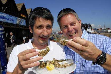 Whitstable Oyster Festival celebration of local food.Sampling the local oysters visitors to the festival left John Dickins, and David Ryan.