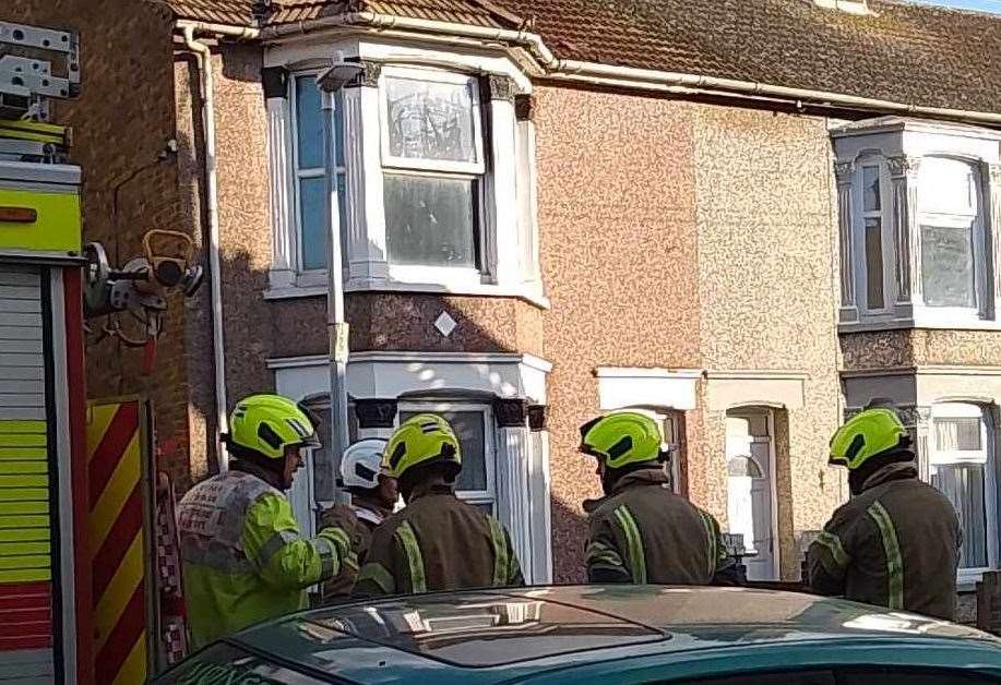 Firefighters at the scene of a house fire in Alexandra Road, Sheerness