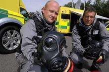 Julian Quinn and Marcus Robson demonstrate their new gear, including respirators, at the launch of HART - Hazardous Area Response Team