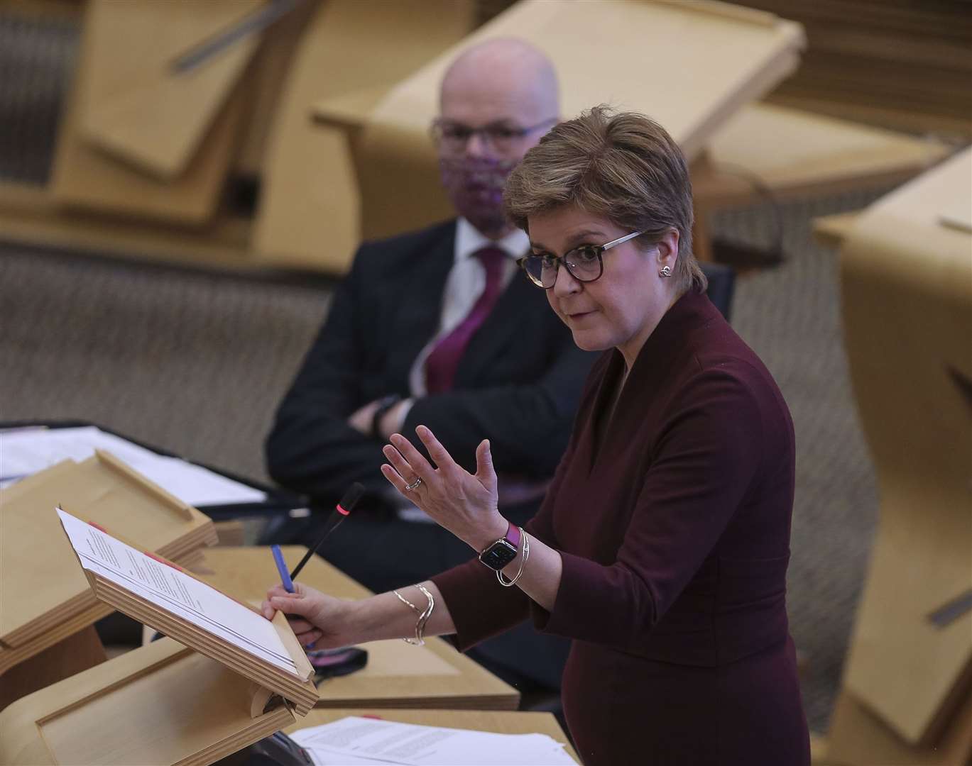 First Minister of Scotland Nicola Sturgeon MSP updates MSPs on any changes to the Covid restrictions at the Scottish Parliament Holyrood Edinburgh (PA)