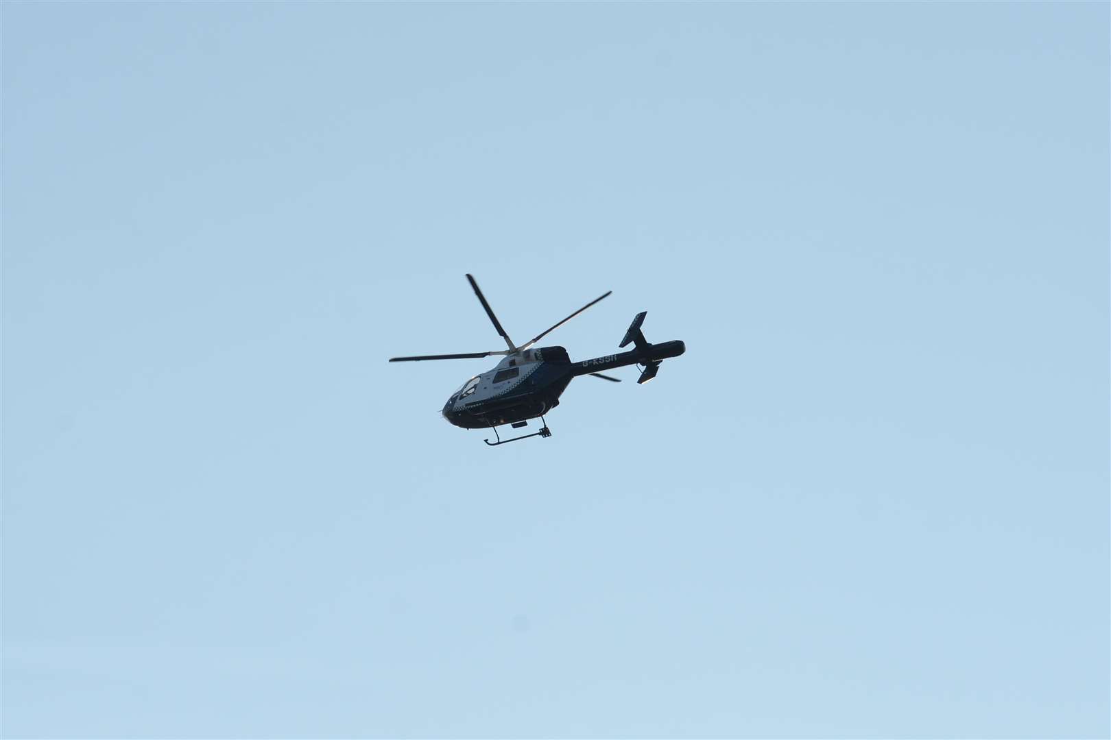 The present air ambulance performed a fly-past over the memorial to the air ambulance crew who crashed 20-years ago at Bluebell Hill on Thursday. Picture: Chris Davey. (3303929)