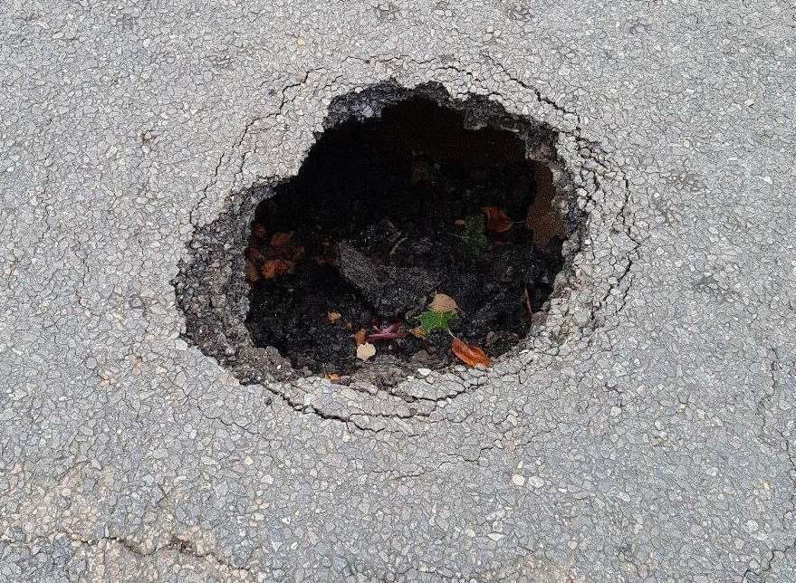 Sinkhole closes Wayfield Road, Chatham at junction with Street End Road