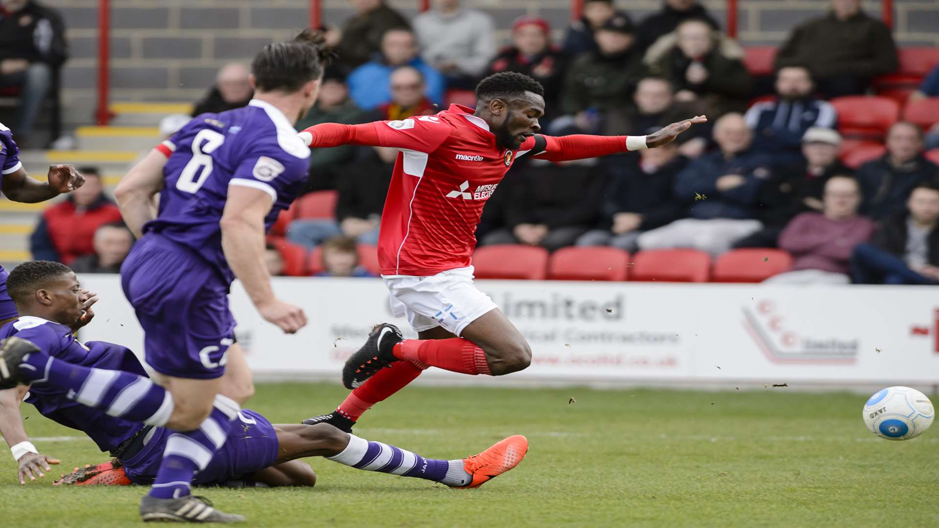 Anthony Cook gets away from an East Thurrock challenge. Pictures: Andy Payton