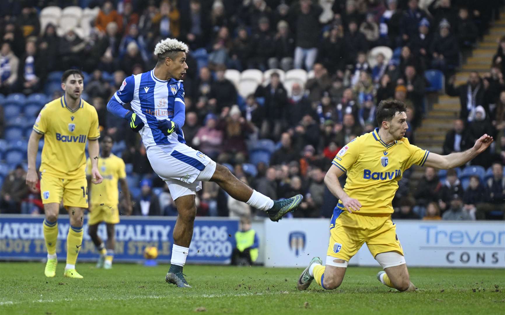 Lyle Taylor scores the opening goal early on in the Boxing Day clash at Colchester Picture: Barry Goodwin