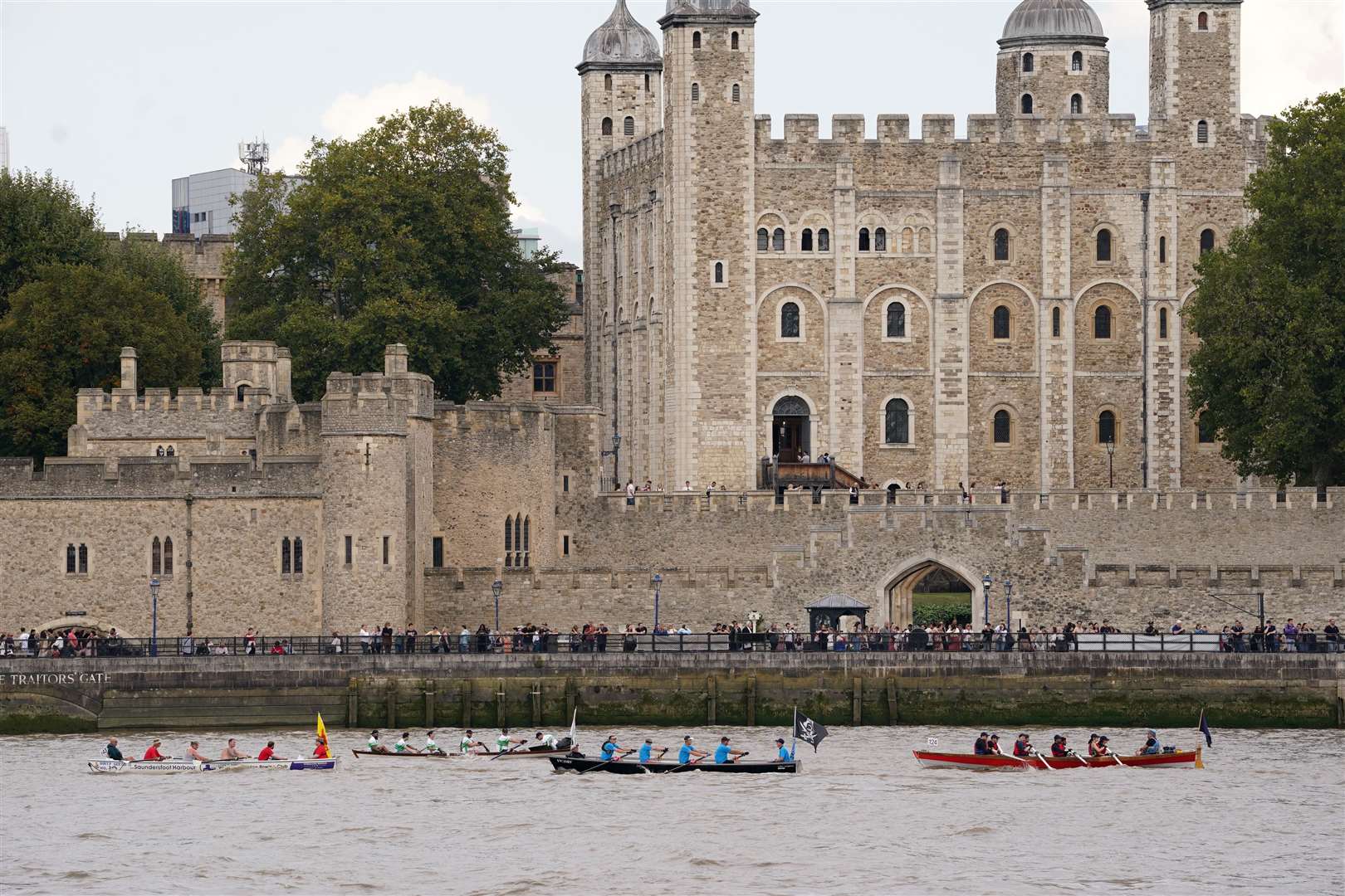 Boats pass the Tower of London (Lucy North/PA)