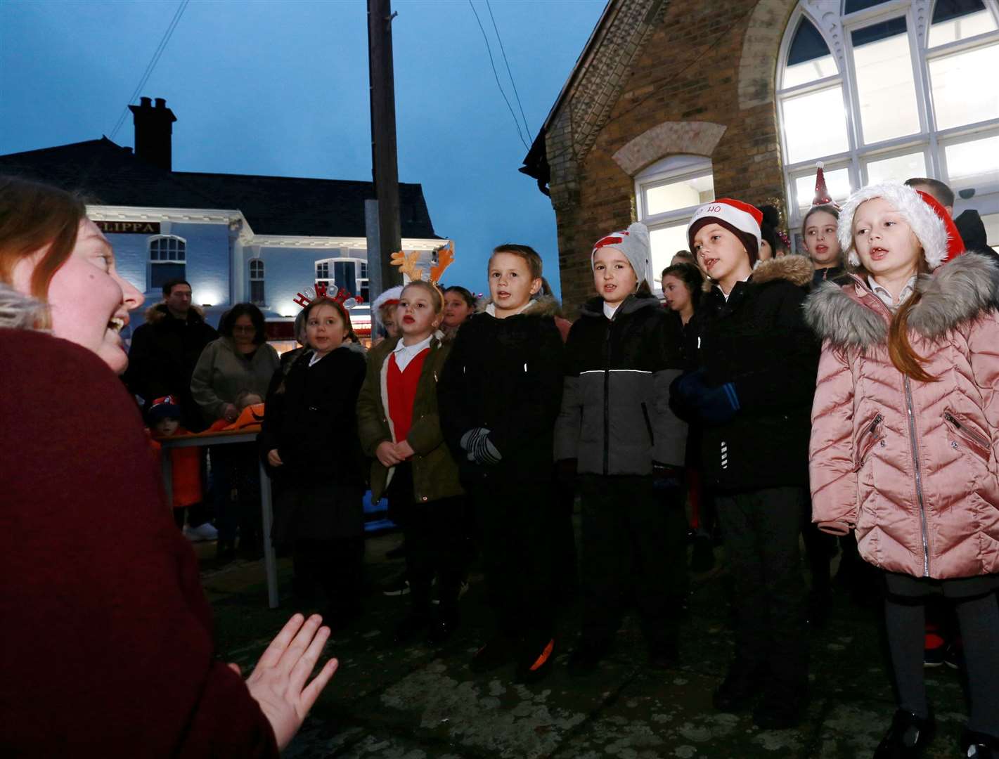 Pupils from Queenborough Primary School and Nursery sang carols at the Queenborough annual Christmas lantern parade on Sunday. Picture: Phil Lee