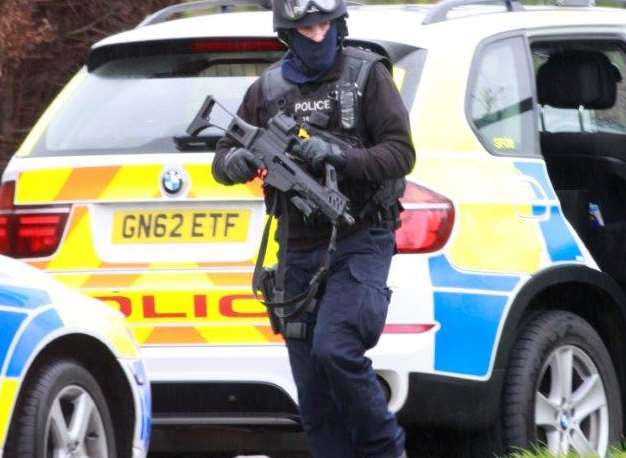 Police descended on the Sittingbourne close. Picture: Travers Bean