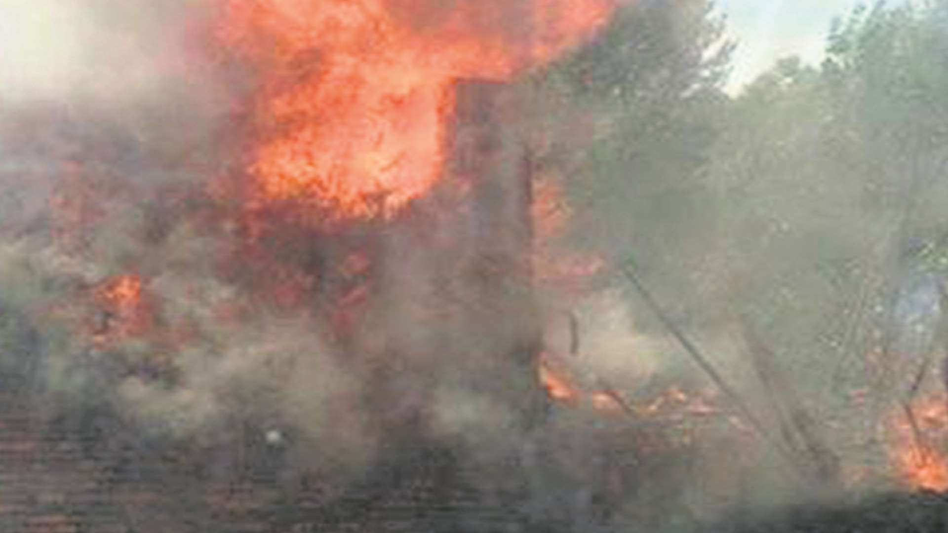 Fire rips through the roof of the flats