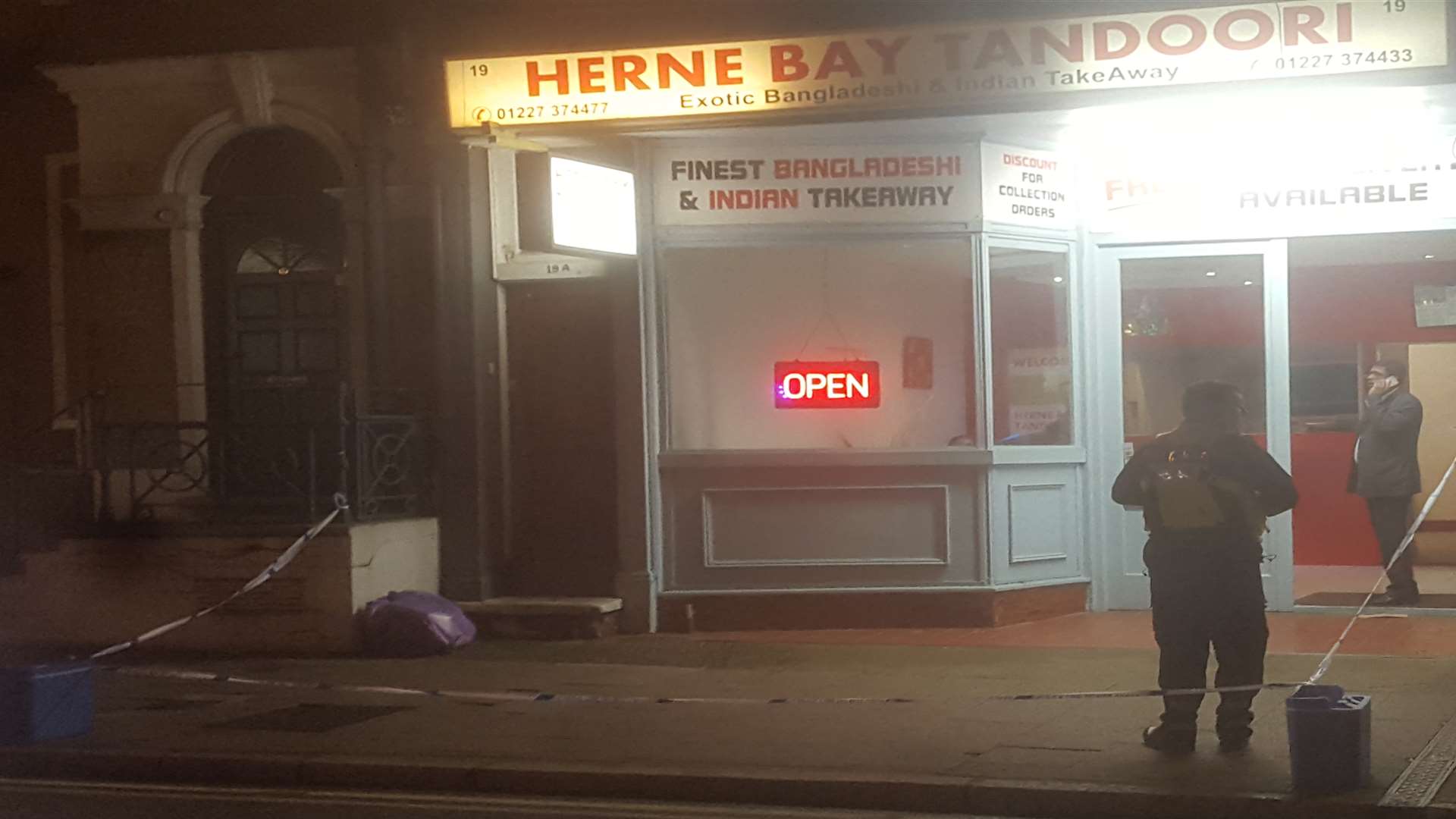 A police cordon around the takeaway