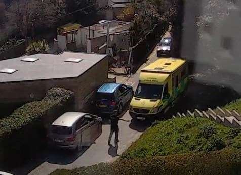 A paramedic guides his colleague out of snarl-up. Video still: Jenny Whitaker