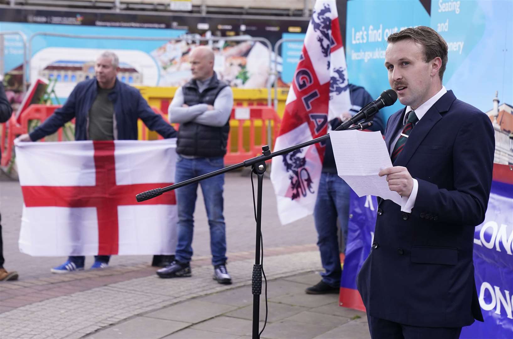 Alek Yerbury speaks during the protest (PA)