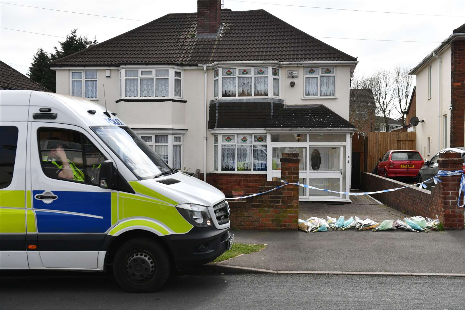 Several tributes were left at the scene following the attack on Lucille Downer, including one which said ‘RIP Nan’ (Jacob King/PA)