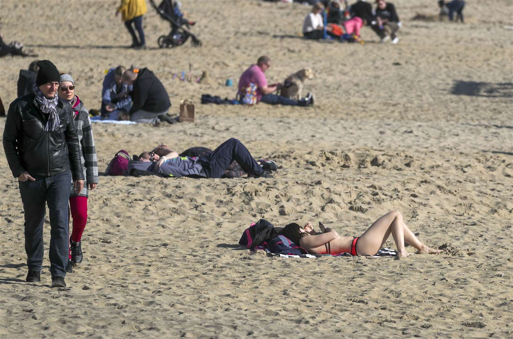 Sun worshippers making the most of the rays (Steve Parsons/PA)