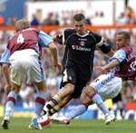 Darren Ambrose takes on two defenders. Picture: ANDY PAYTON