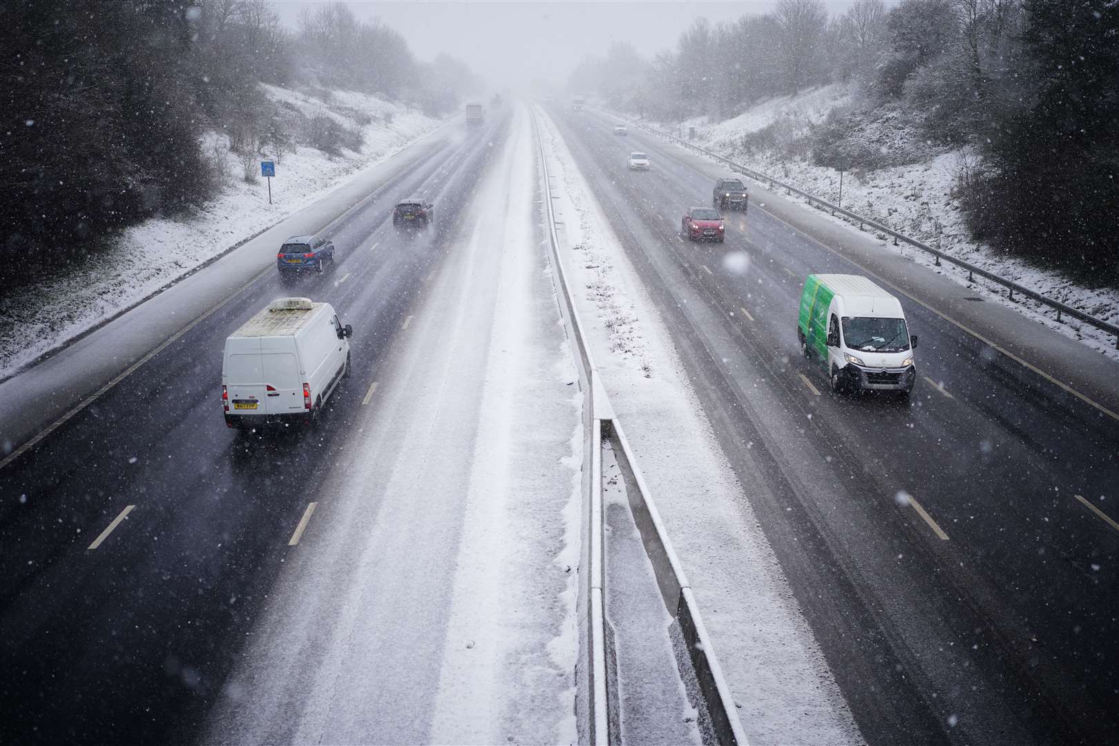 Main roads are the most likely to be gritted and cleared of snow (Ben Birchall/PA)