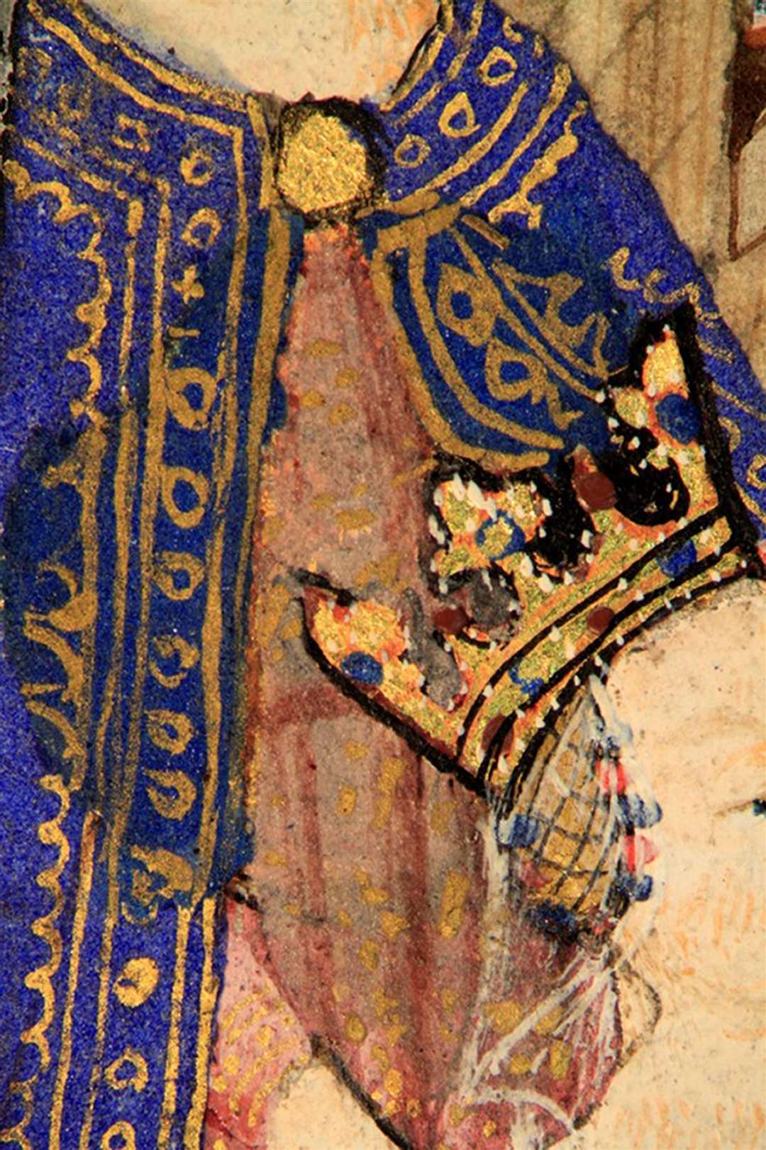 Isabella’s ducal coronet, and figure of St Catherine from a page from the Book of Hours (Katie Young/Fitzwilliam Museum/PA)