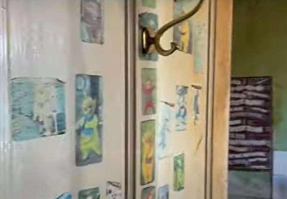 Teletubbies stickers on the kitchen door. Picture: Clive Emson / YouTube