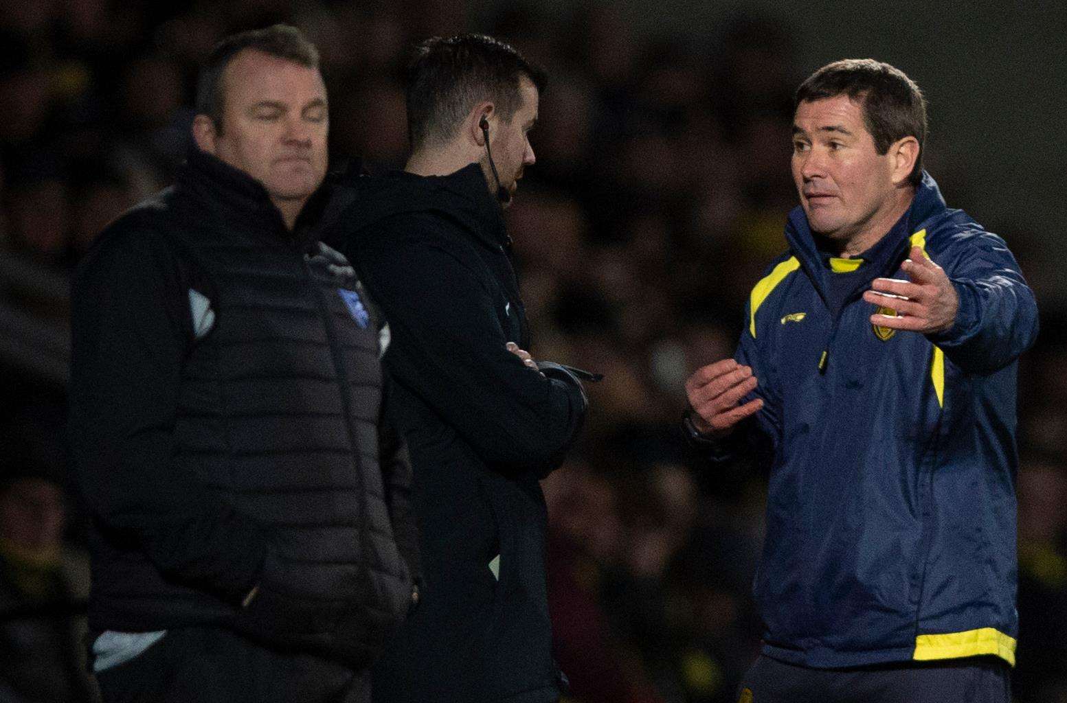 Burton manager Nigel Clough argues with the fourth official Picture: Ady Kerry