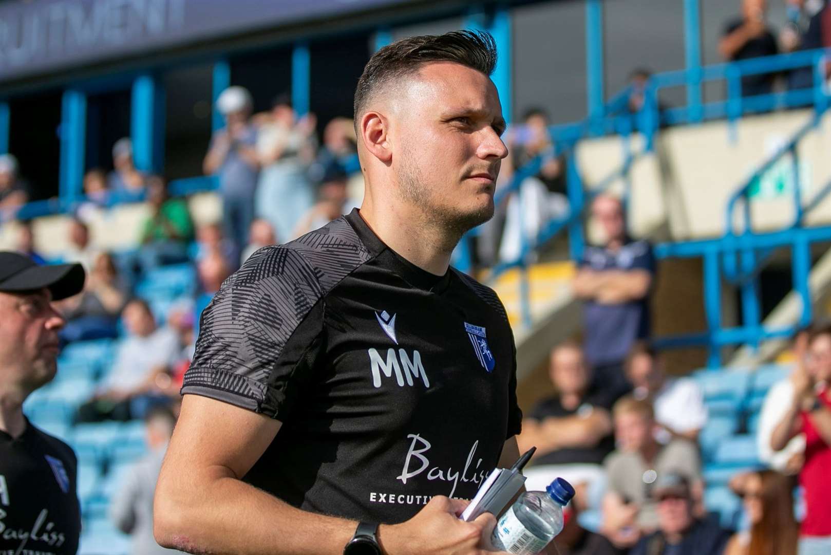 Gillingham under-18 manager Mark Moss is assisting interim boss Keith Millen