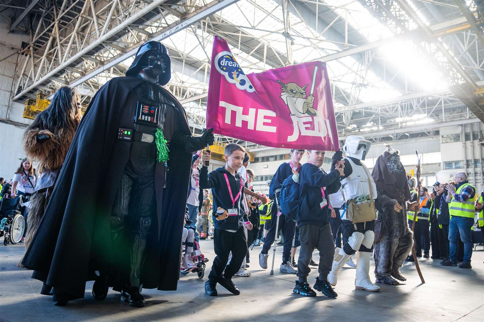 Children from the Jedi group parade with Darth Vader (James Manning/PA)