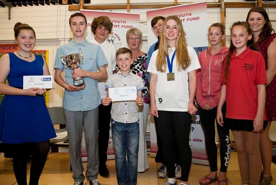 The nine youngsters who received Swale Youth Development Fund backing, with the charity's chairman, Carole Nealey