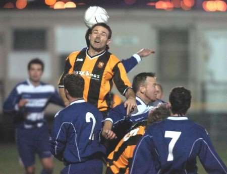 Invicta's Mark Saunders in the thick of the action in Monday night's match. Picture: BARRY GOODWIN